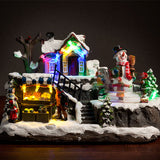 Božični prizor z lučkami in gibljivimi elementi (12 LED)